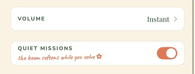 Two rows from an alarm’s settings: “VOLUME”, set to “Instant”, and “QUIET MISSIONS”, switched on and subtitled “the boom softens while you solve”.